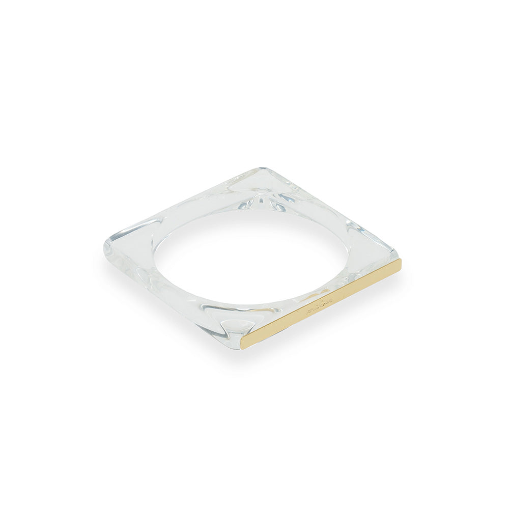 BRACCIALE RIGIDO QUADRATO TRASPARENTE CON PARTICOLARE IN OTTONE