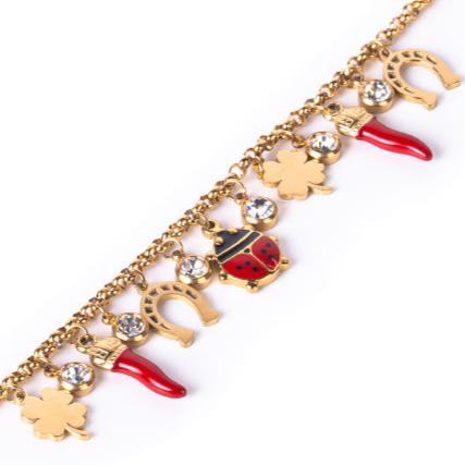 BRACCIALE MORBIDO CON PENDENTI PORTAFORTUNA