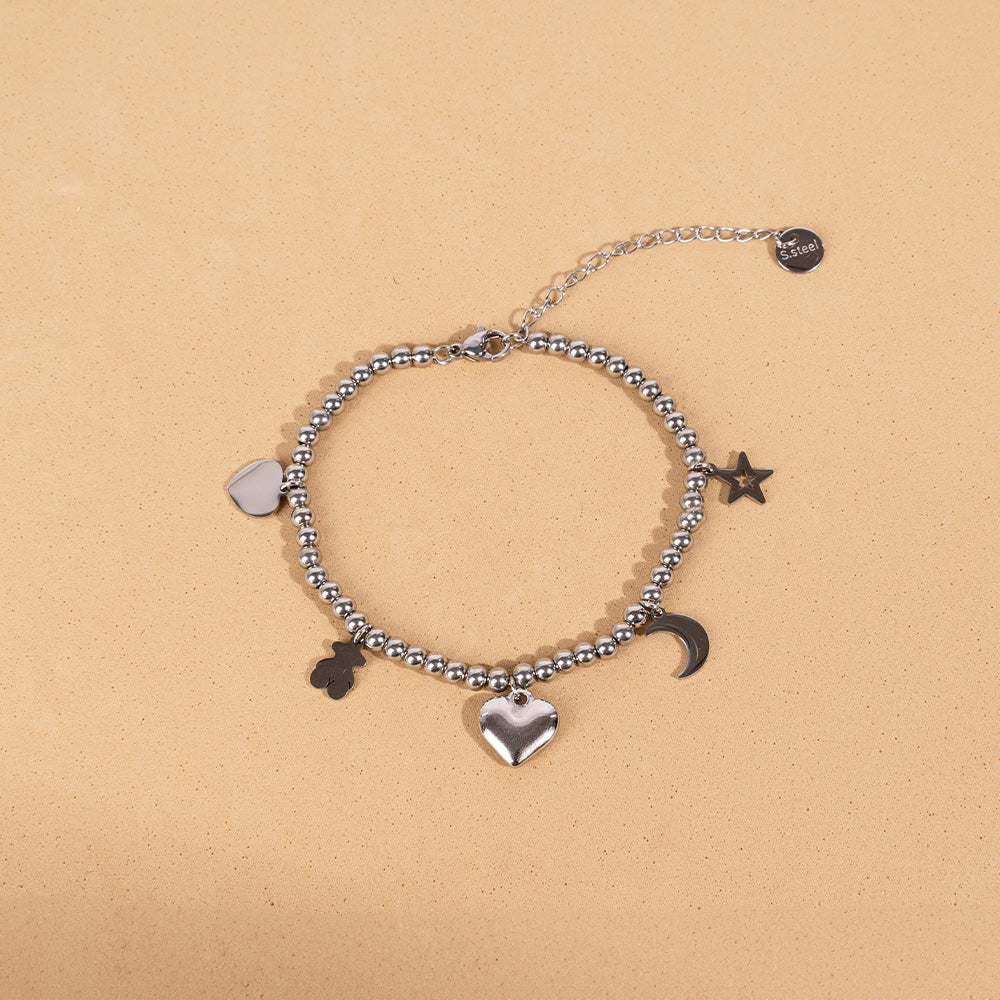 BRACCIALE MORBIDO CON CUORI, ORSETTO, STELLA E LUNA PENDENTI