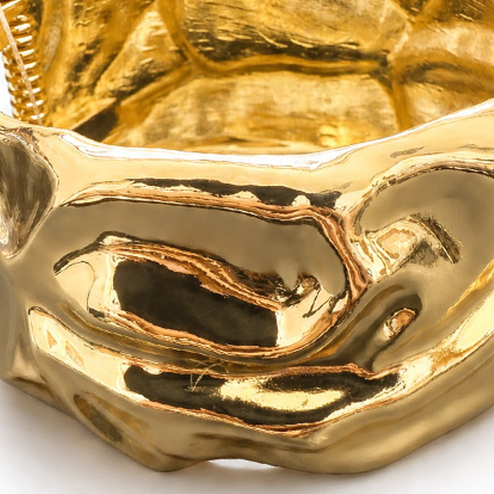 BRACCIALE RIGIDO CON TEXTURE IRRECOLARE E MOLLA