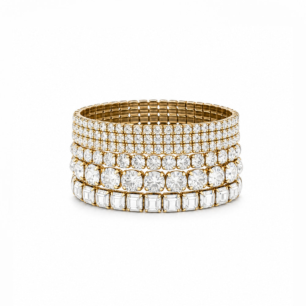 SET DI 9 BRACCIALI ELASTICI CON STRASS DI VARIE DIMENSIONI