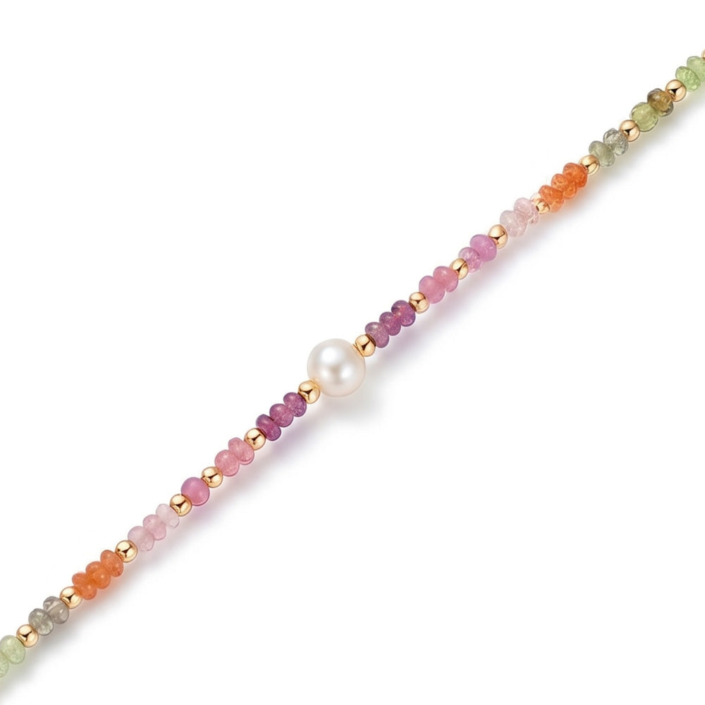 BRACCIALE CON CRISTALLI COLORATI E PERLA CENTRALE