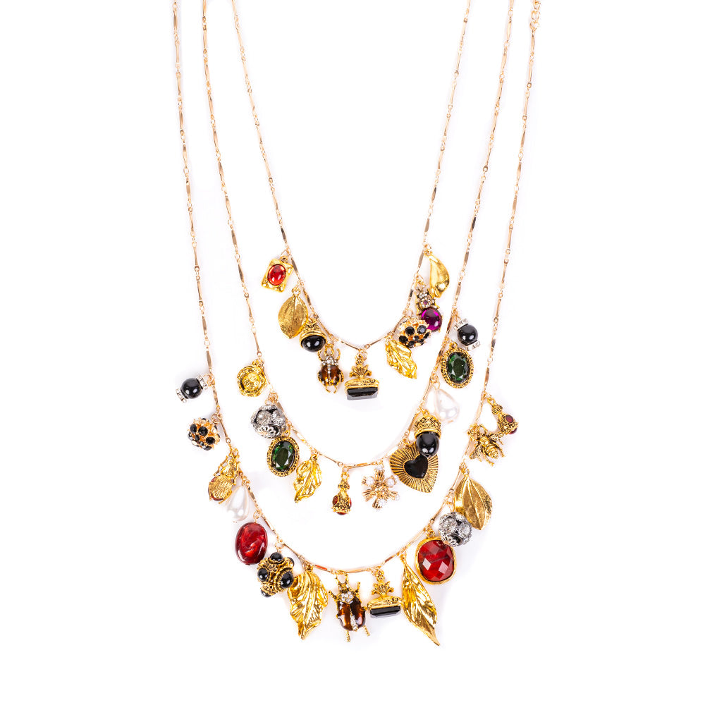 SET OF 3 NECKLACES WITH STONES AND LEAF AND OTHER SHAPED PENDANTS