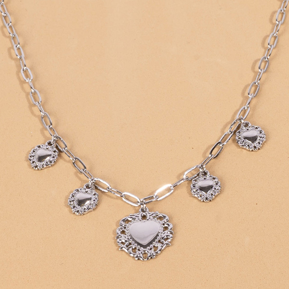 CHOKER NECKLACE WITH FIVE SACRED HEARTS PENDANTS