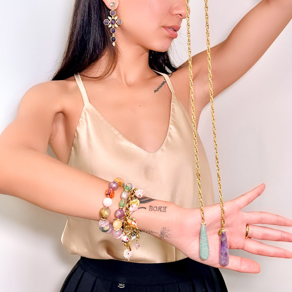 BRACCIALE CON CIONDOLI VARI FIORI E PIETRE