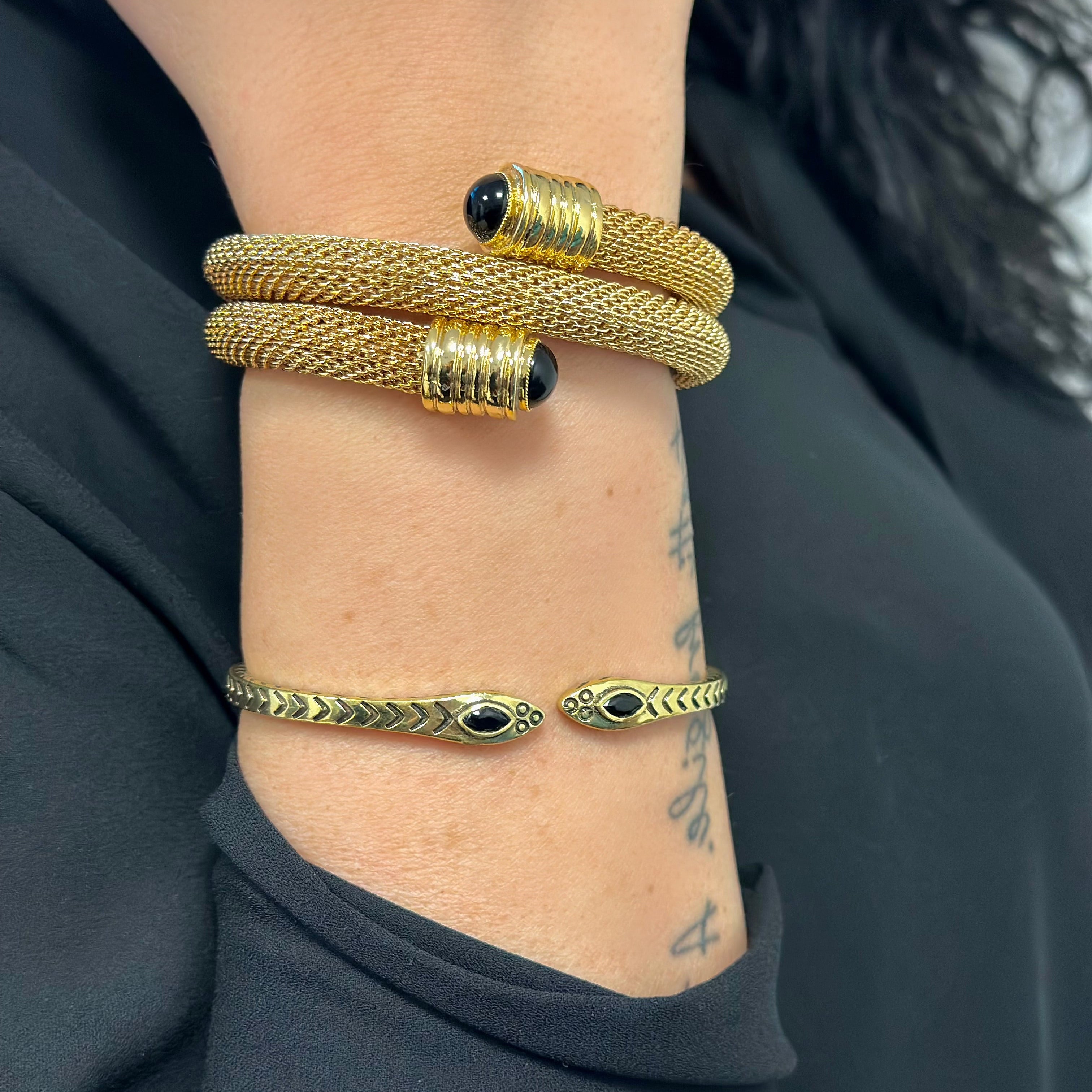 BRACCIALE RIGIDO CON SERPENTE E PIETRE