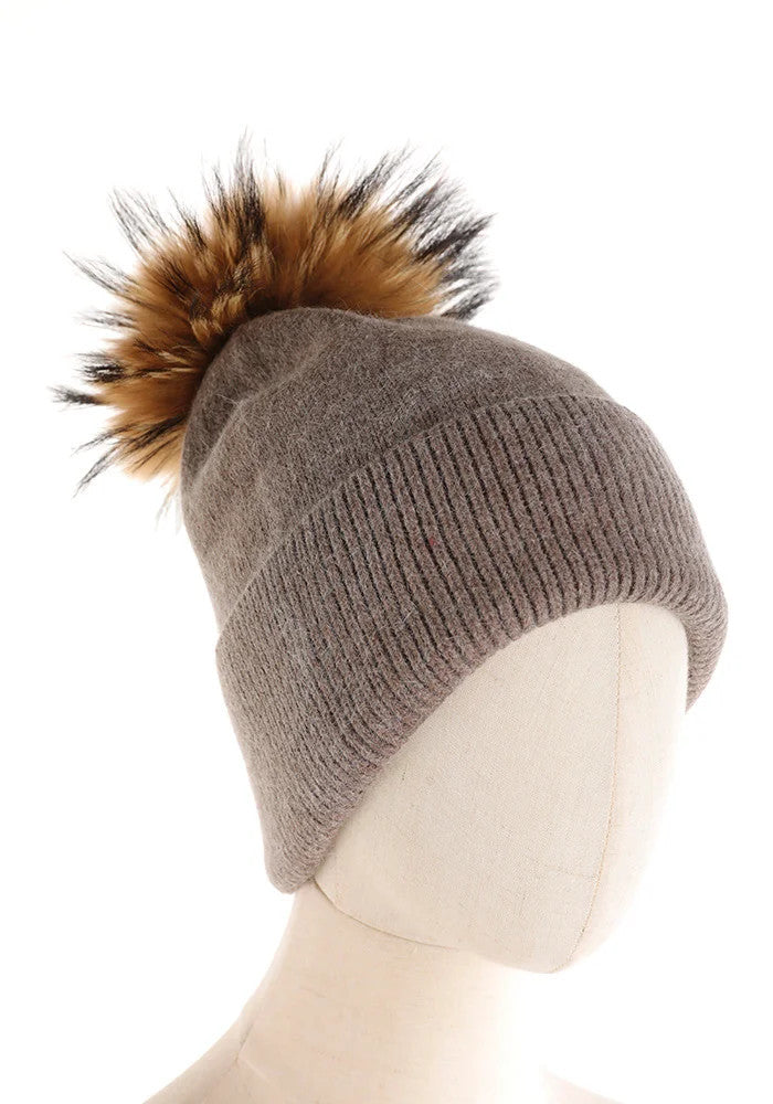 CAPPELLO A CUFFIA CON PON PON IN PELLICCIA