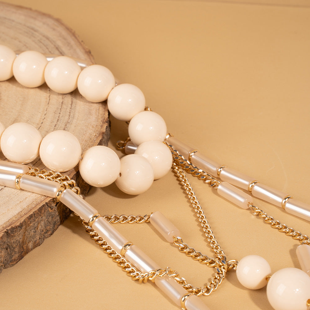 COLLANA LUNGA CON SFERE E CATENE