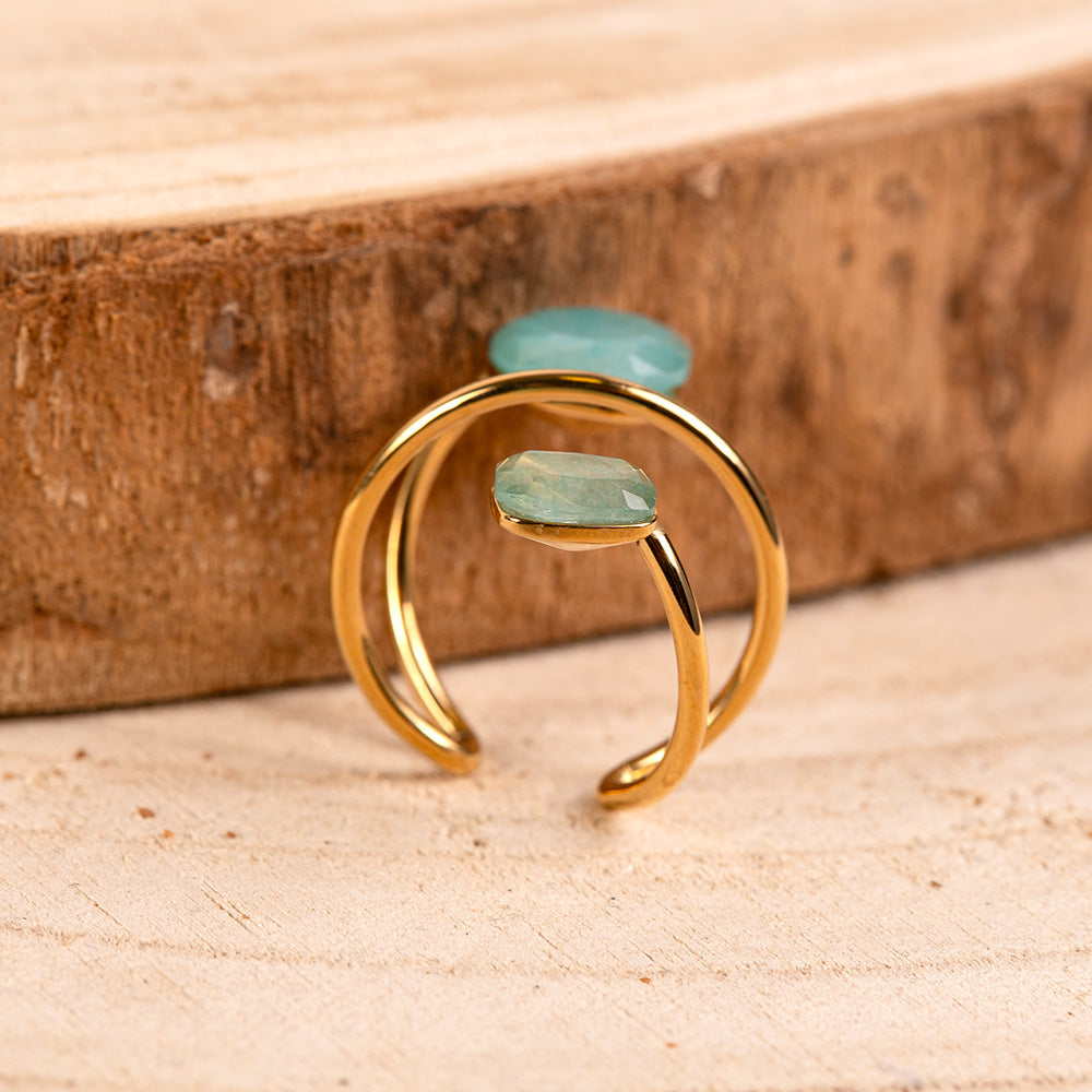 LINEAR RING WITH STONES AT THE ENDS