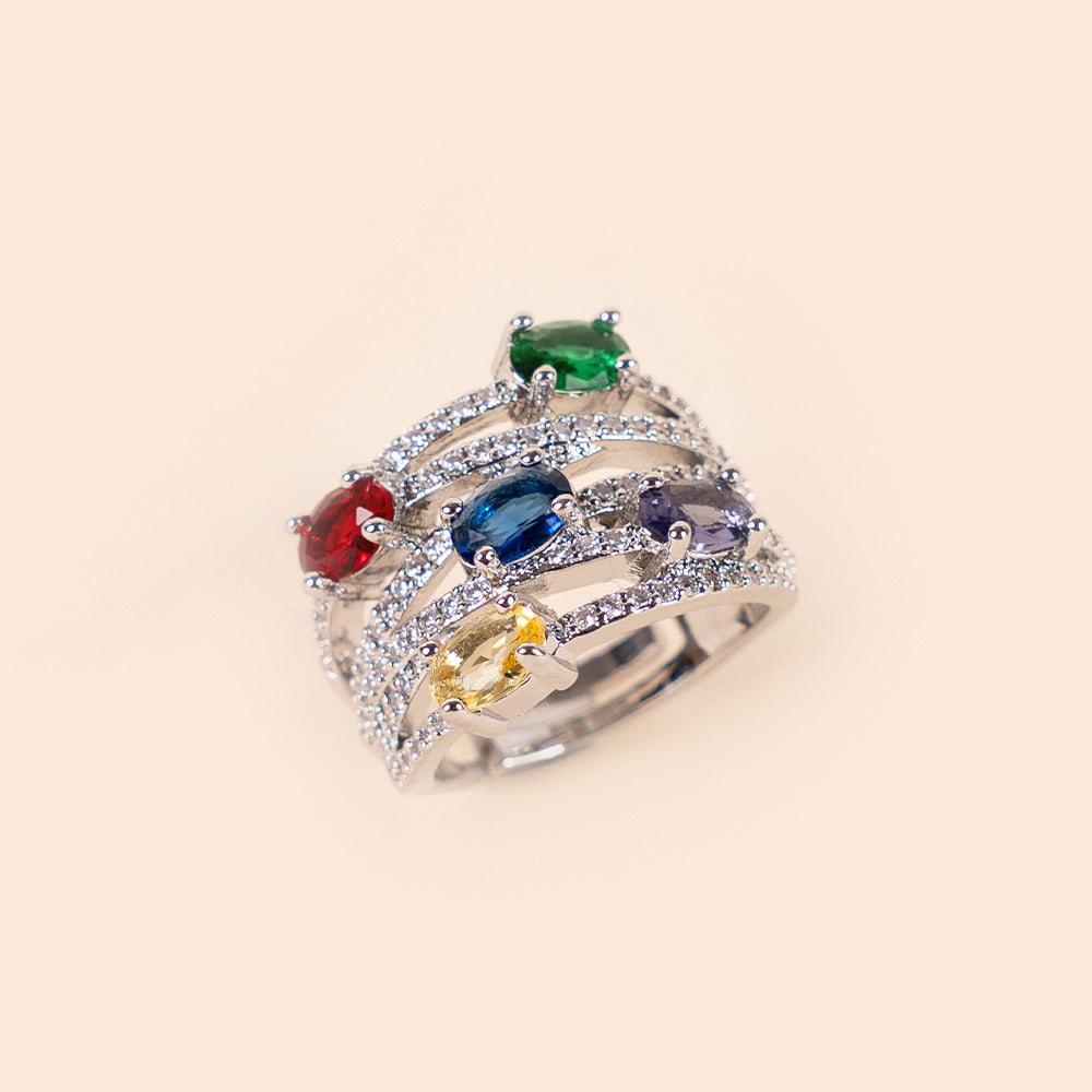 ANELLO A FASCIA CON FILE DI STRASS E PIETRE GRANDI COLORATE