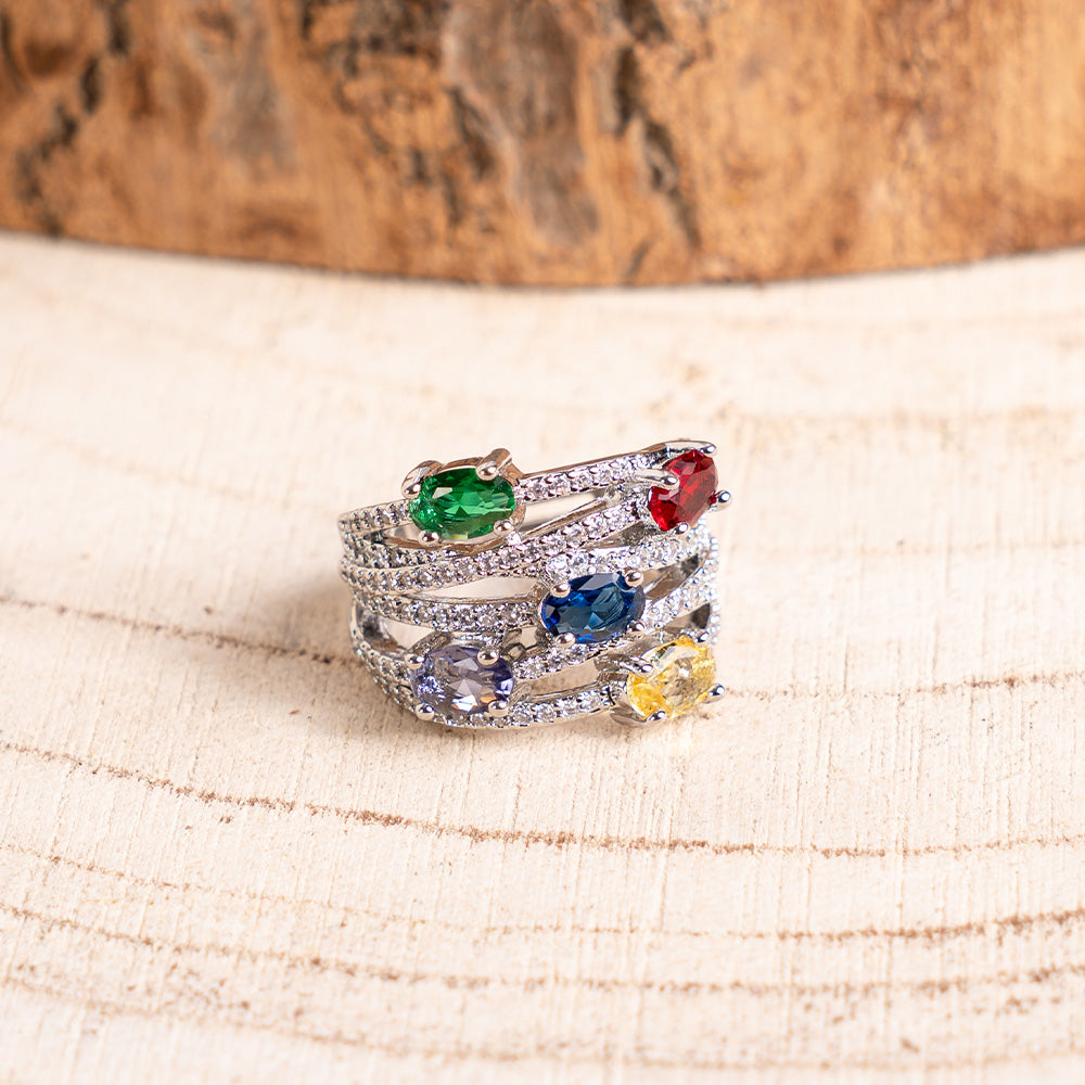 ANELLO A FASCIA CON FILE DI STRASS E PIETRE GRANDI COLORATE