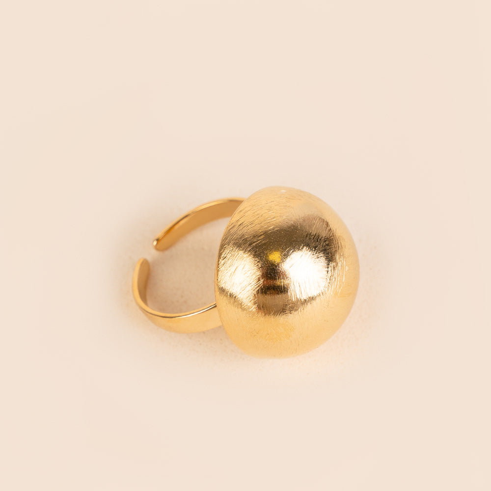 ANELLO REGOLABILE CON MEZZA SFERA RIGATA
