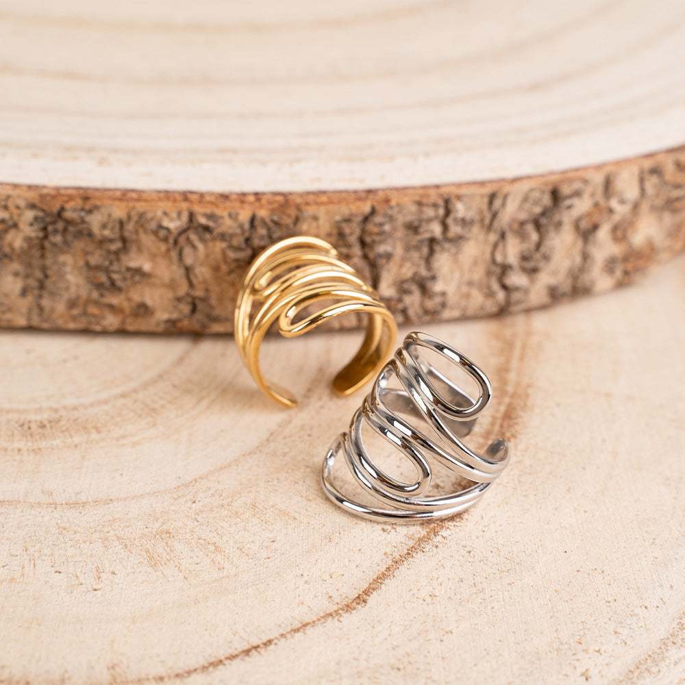 ANELLO A FASCIA CON LINEE CURVE