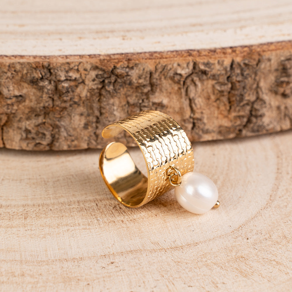 ANELLO A FASCIA INTAGLIATO CON MADREPERLA PENDENTE