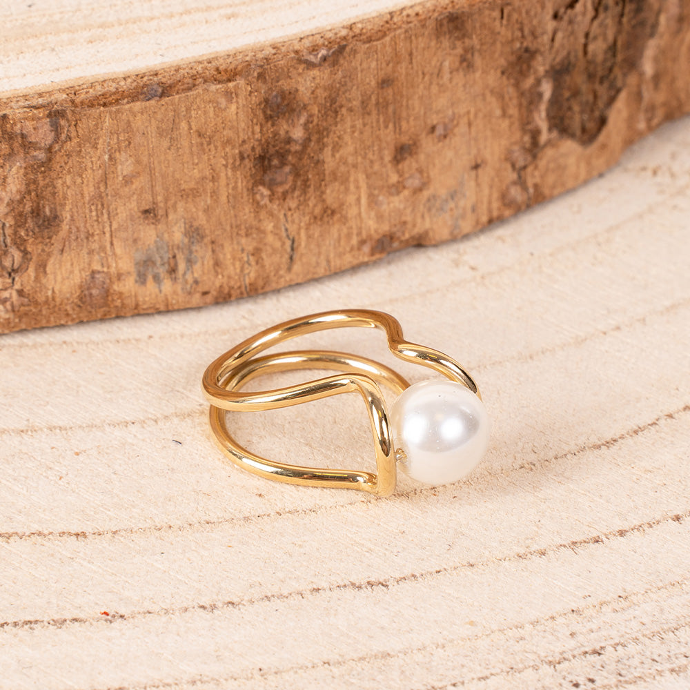 ANELLO CON PERLA CENTRALE E STRUTTURA MINIMALE