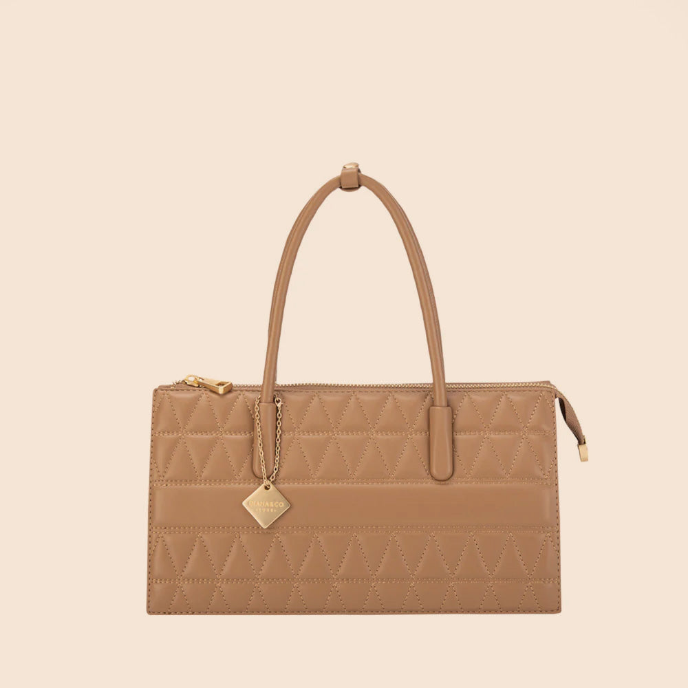 BORSA A MANO TRAPUNTATA