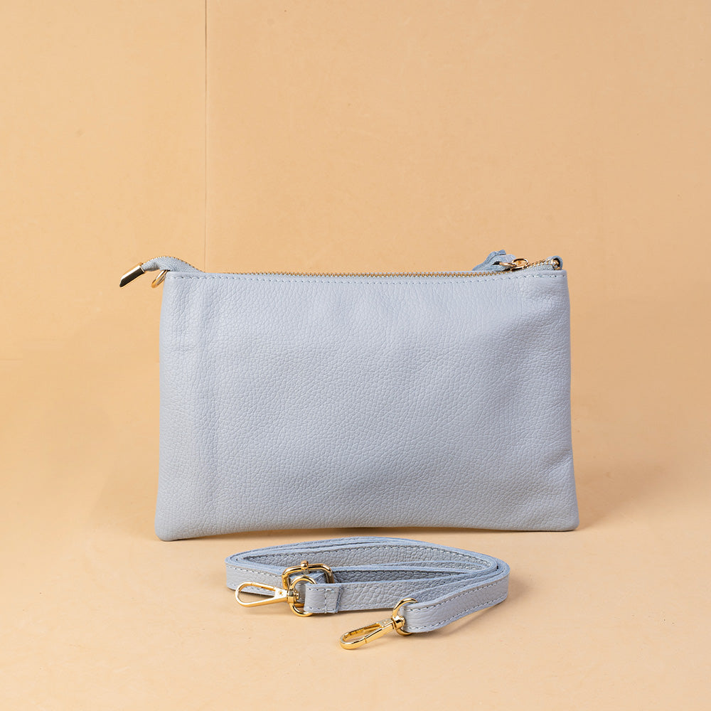 BORSA POCHETTE CON BORCHIE E TRACOLLA REGOLABILE