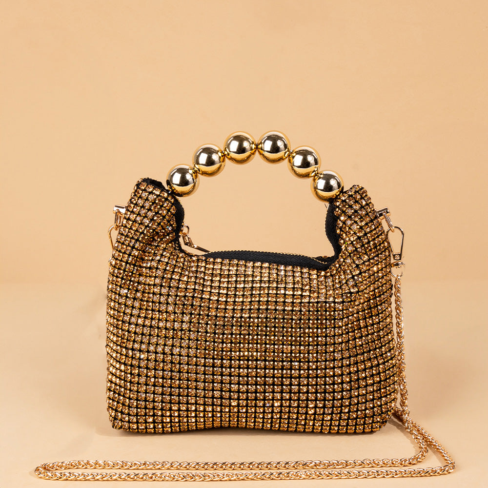 HANDBAG MODEL WITH RHINESTONE AND SPHERES ON THE HANDLE