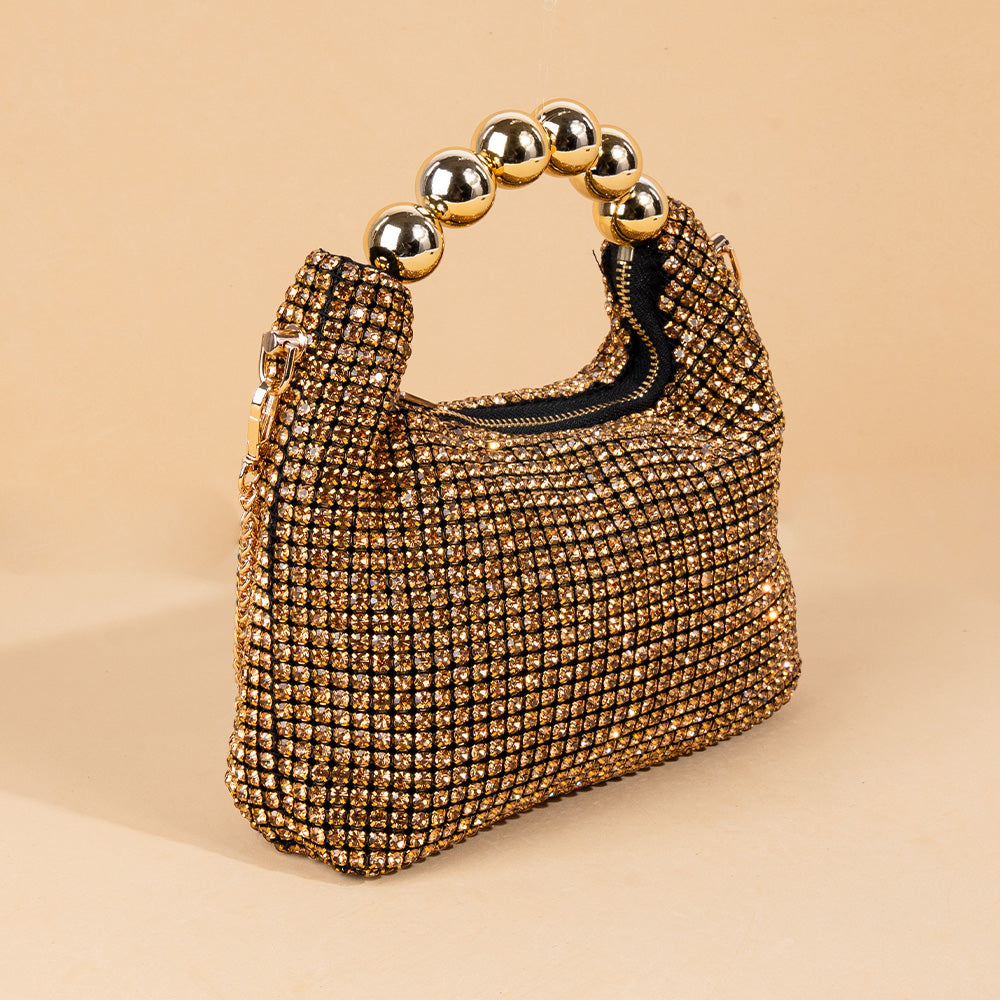 HANDBAG MODEL WITH RHINESTONE AND SPHERES ON THE HANDLE