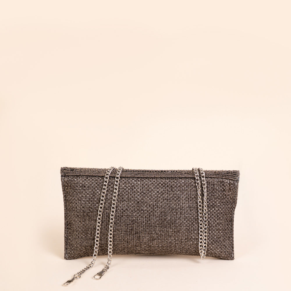 BORSA CLUTCH IN TESSUTO E PERLINE SUL FRONTE