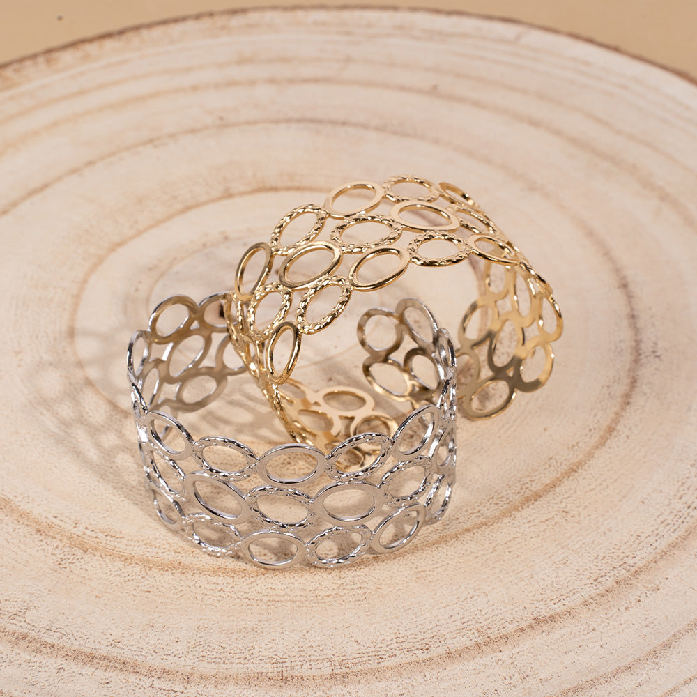 BRACCIALE RIGIDO A FASCIA CON TRE FILE DI ANELLI