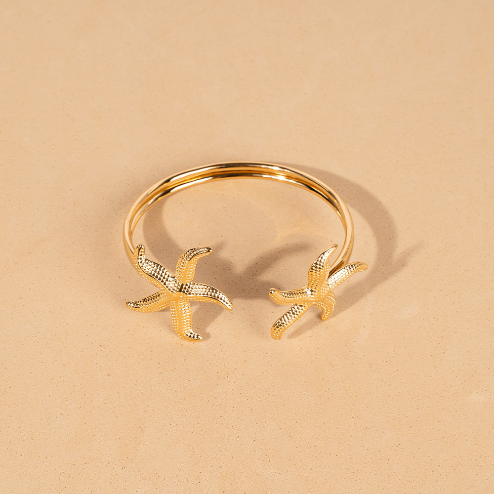 BRACCIALE RIGIDO APERTO CON DOPPIA STELLA MARINA