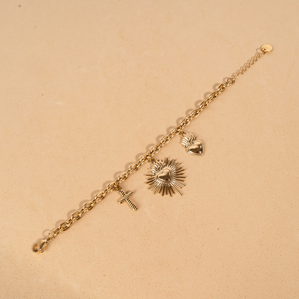 BRACCIALE MORBIDO CON DUE CUORI SACRI E CROCE PENDENTE