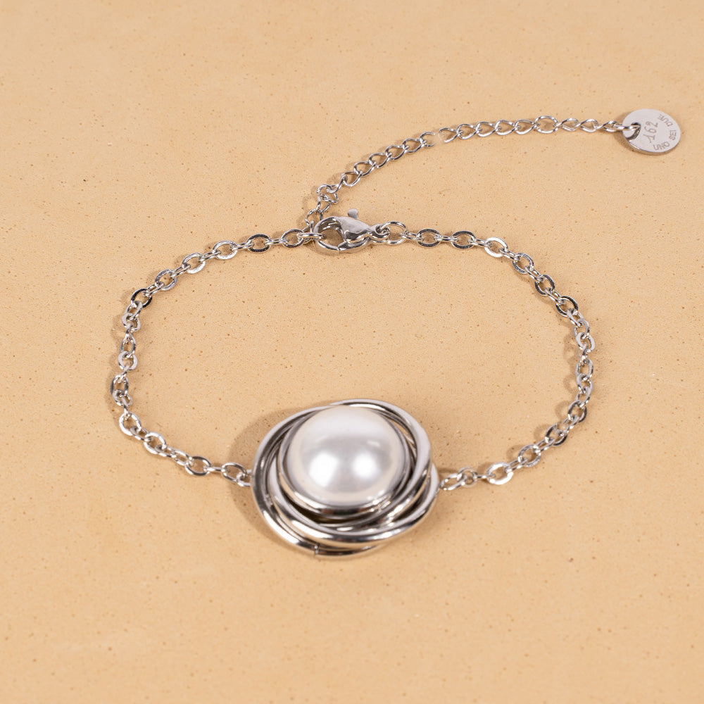 BRACCIALE CON DECORAZIONE CIRCOLARE E PERLA