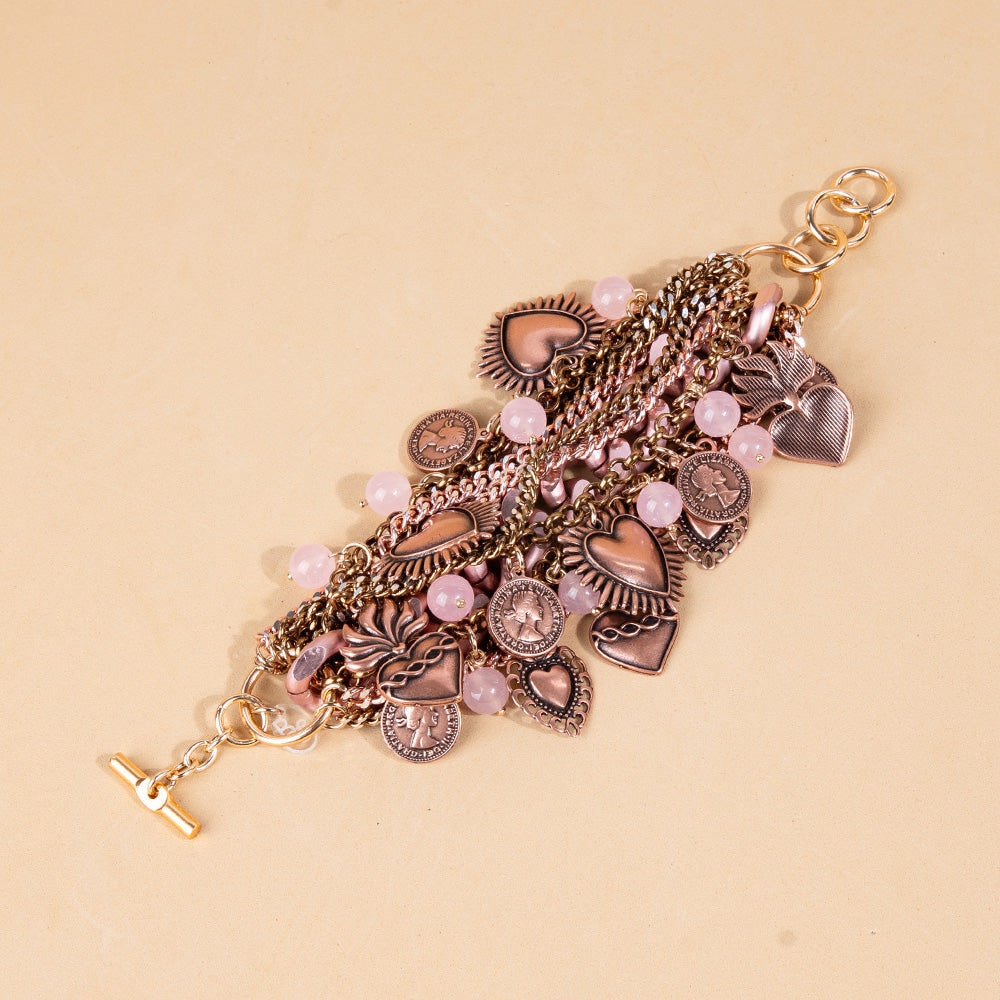 BRACCIALE CON CATENE E PENDENTI SACRO CUORE E MONETE