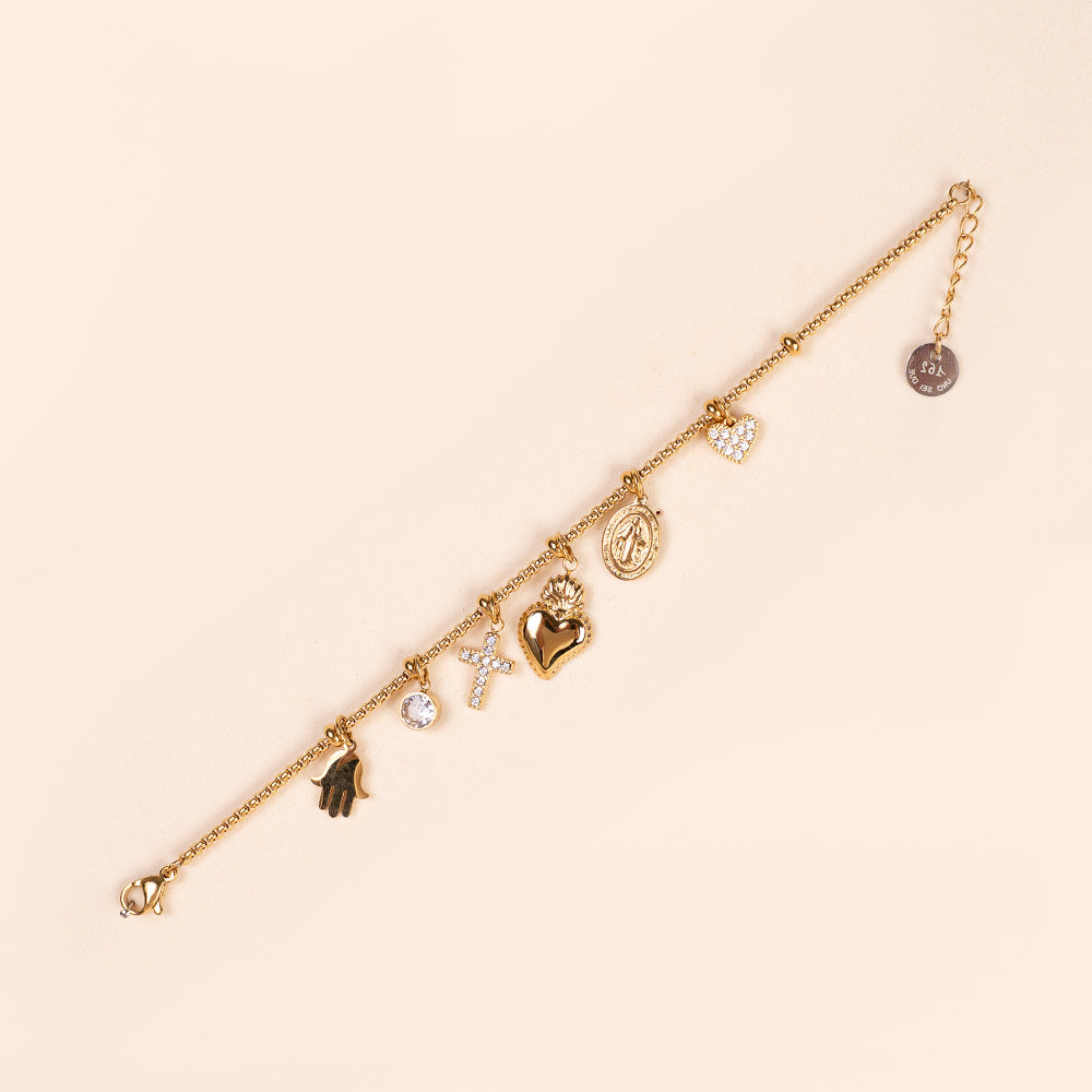 BRACCIALE CON PENDENTI CUORE SACRO ,CROCE E MANO DI FATIMA