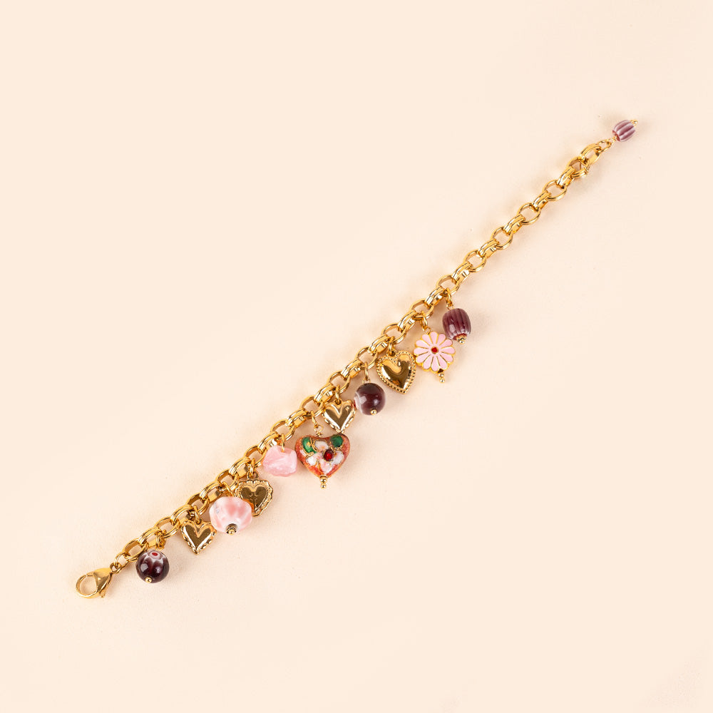 BRACCIALE CON CIONDOLI VARI FIORI E PIETRE