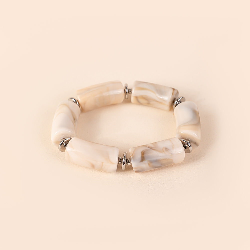 BRACCIALE ELASTICO CON PIETRE A CILINDRO