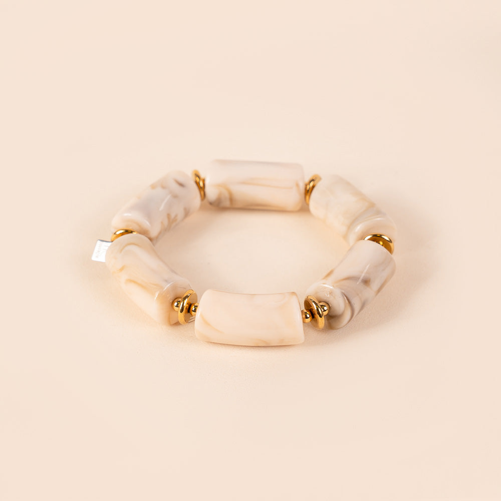 BRACCIALE ELASTICO CON PIETRE A CILINDRO