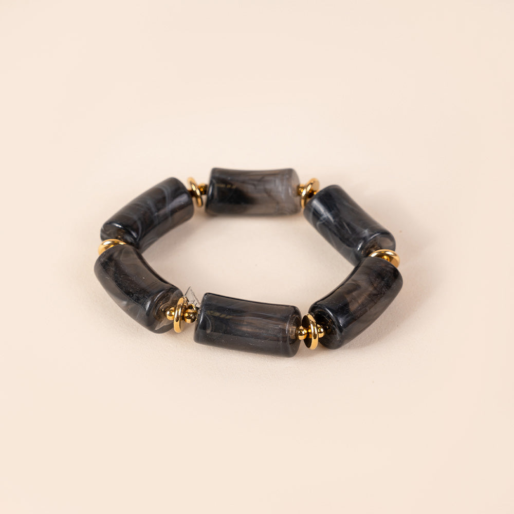 BRACCIALE ELASTICO CON PIETRE A CILINDRO