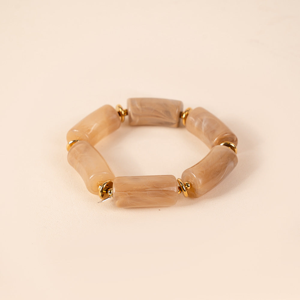 BRACCIALE ELASTICO CON PIETRE A CILINDRO