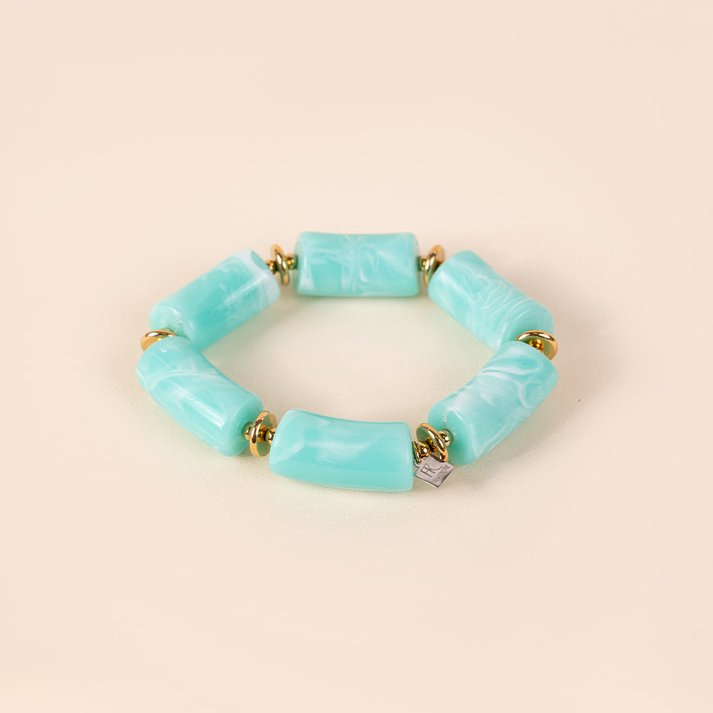 BRACCIALE ELASTICO CON PIETRE A CILINDRO