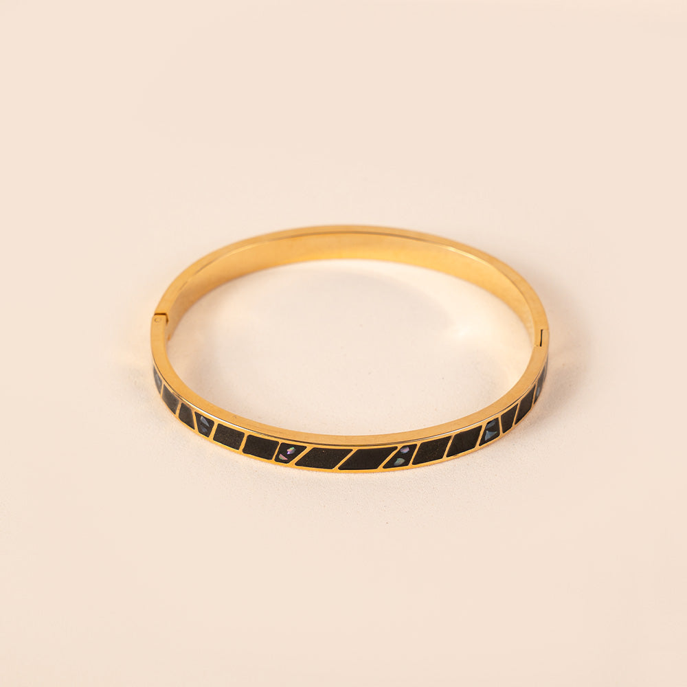 BRACCIALE RIGIDO OVALE CON DETTAGLI GEOMETRICI COLORATI