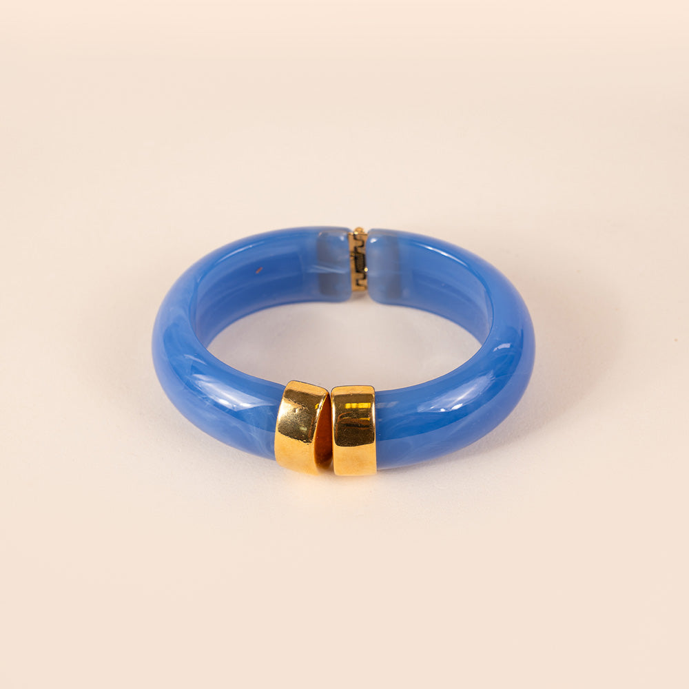 BRACCIALE RIGIDO IN RESINA MARMORIZZATA CON CHIUSURA A MOLLA