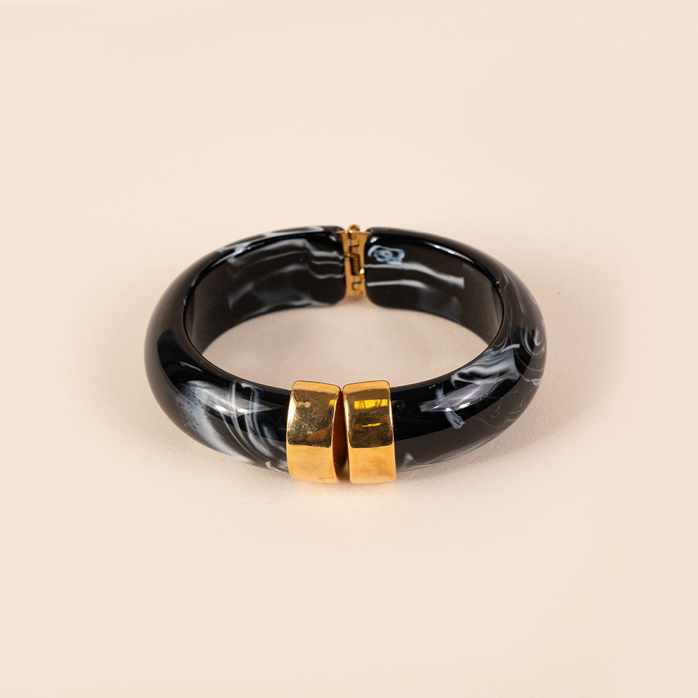 BRACCIALE RIGIDO IN RESINA MARMORIZZATA CON CHIUSURA A MOLLA