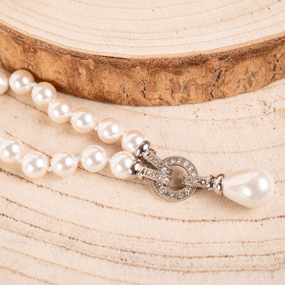 BRACCIALE CON PERLE E CHIUSURE CON STRASS