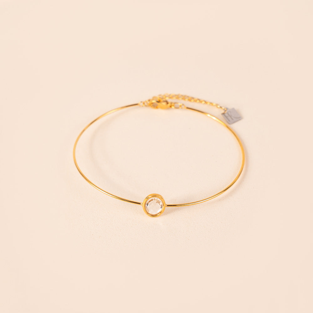 BRACCIALE RIGIDO FINO CON PIETRA OVALE CENTRALE
