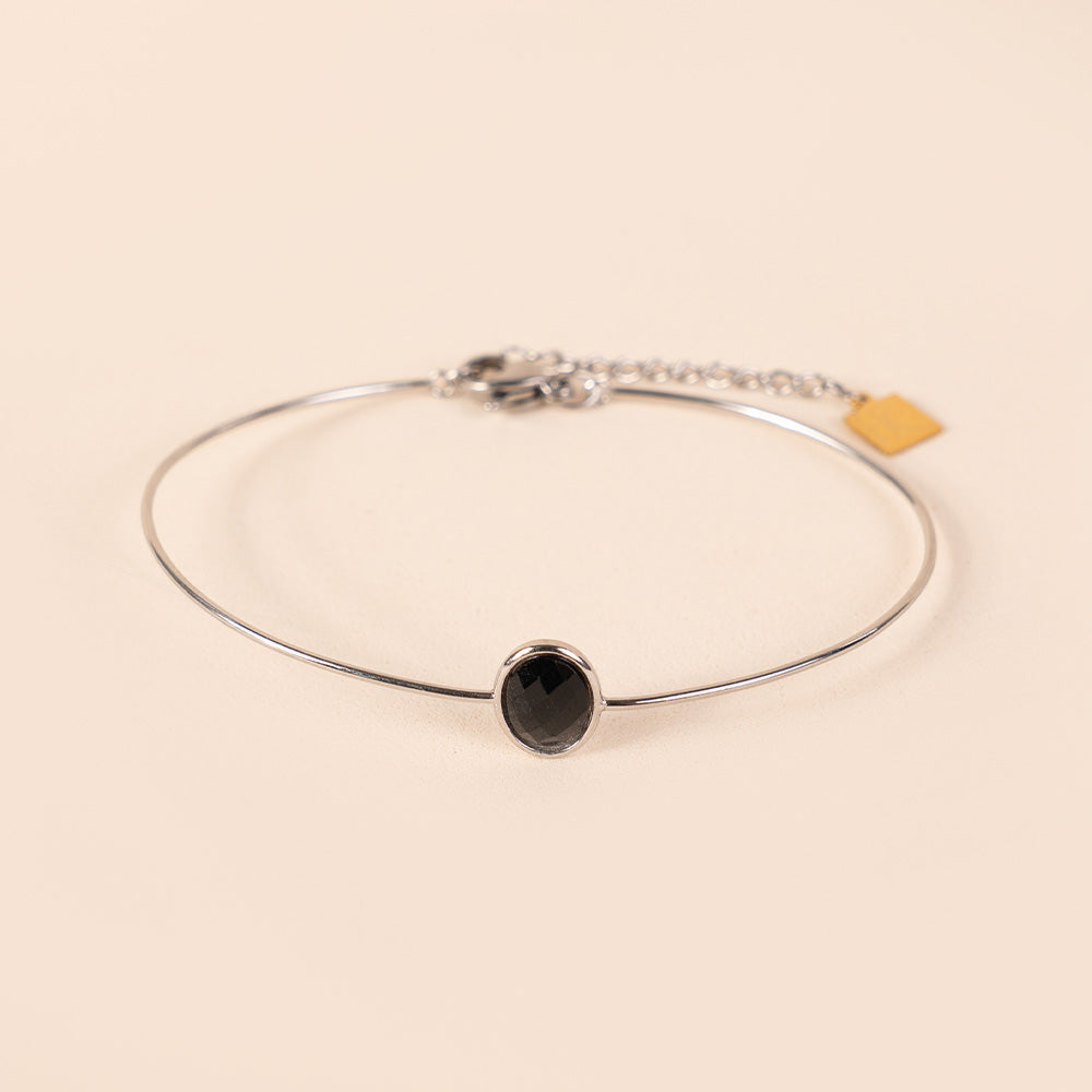 BRACCIALE RIGIDO FINO CON PIETRA OVALE CENTRALE