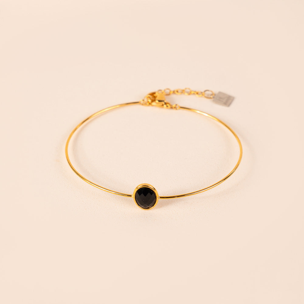 BRACCIALE RIGIDO FINO CON PIETRA OVALE CENTRALE