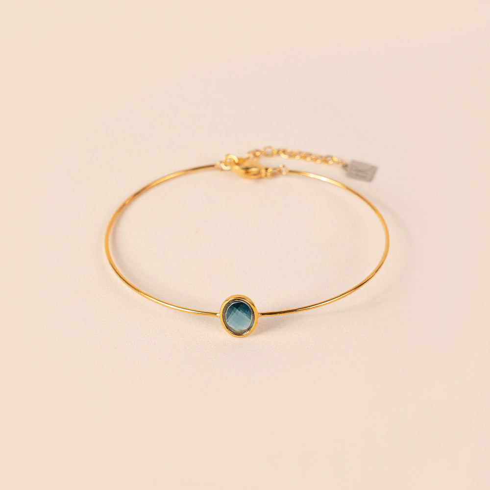 BRACCIALE RIGIDO FINO CON PIETRA OVALE CENTRALE