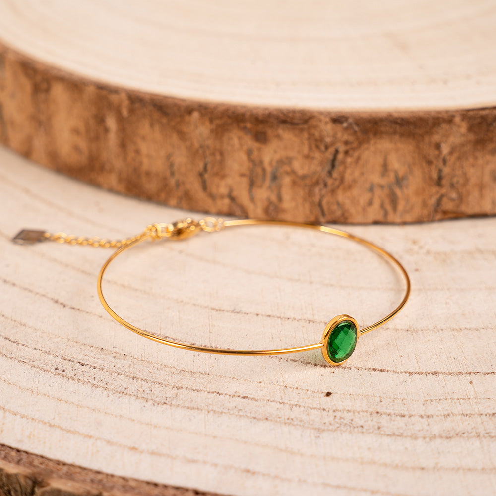 BRACCIALE RIGIDO FINO CON PIETRA OVALE CENTRALE