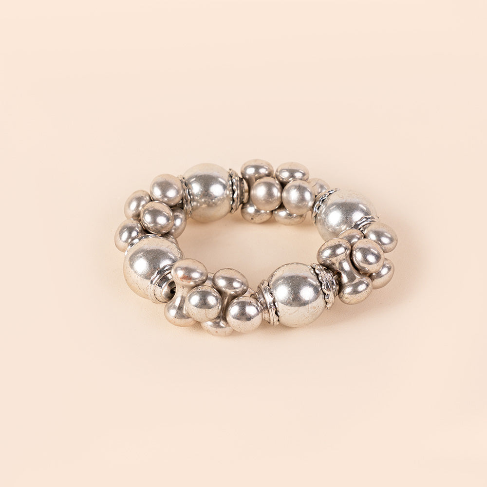 BRACCIALE ELASTICO CON UNITA' DIFFERENTI ALTERNATE