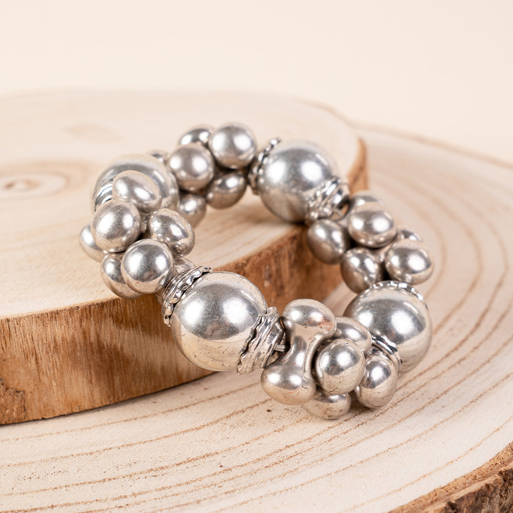 BRACCIALE ELASTICO CON UNITA' DIFFERENTI ALTERNATE