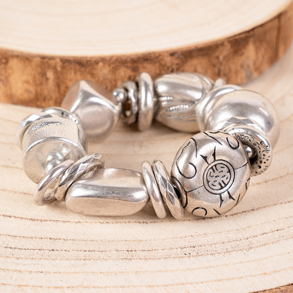 BRACCIALE ELASTICO CON PARTICOLARI INTAGLIATI