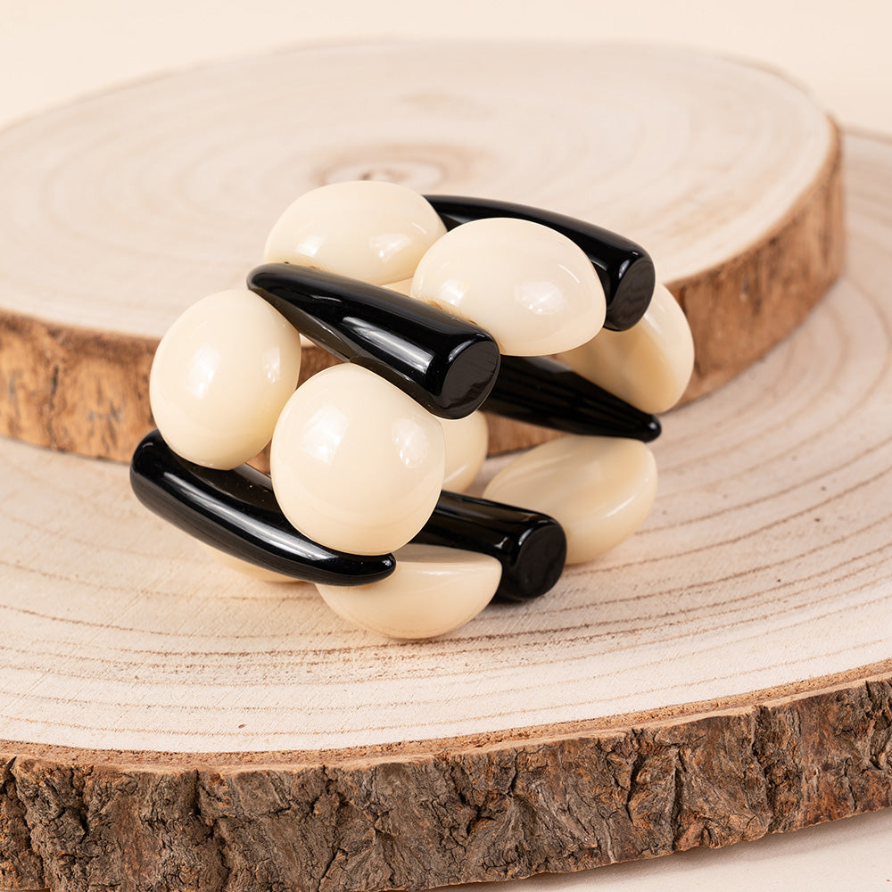 BRACCIALE ELASTICO CON MEZZE SFERE A CONTRASTO