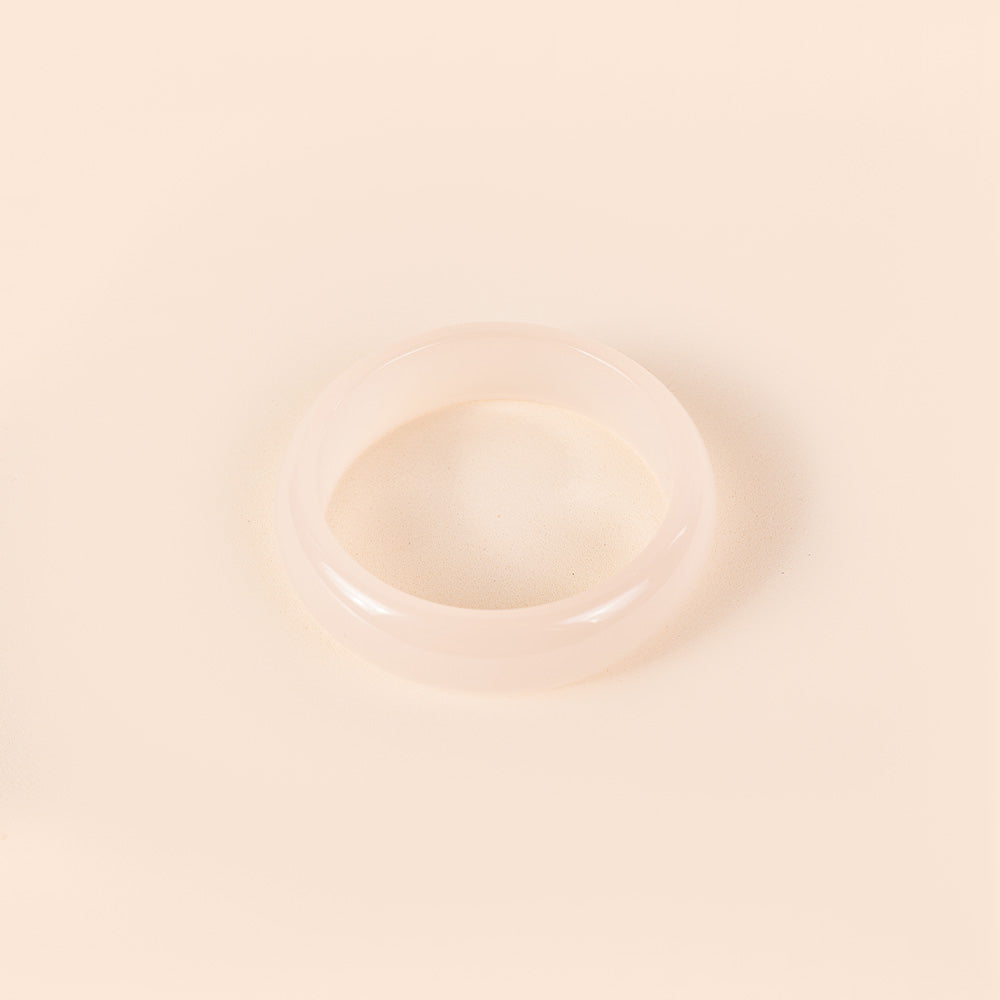 BRACCIALE RIGIDO IN RESINA SEMI-TRASPARENTE